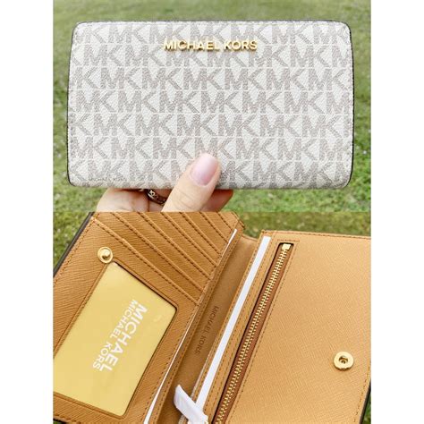 review michael kors jet set travel medium slim wallet|Michael Kors Wallet double zip.